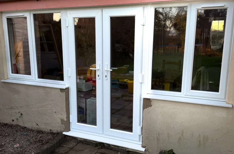 White patio doors for a home in Templecombe.