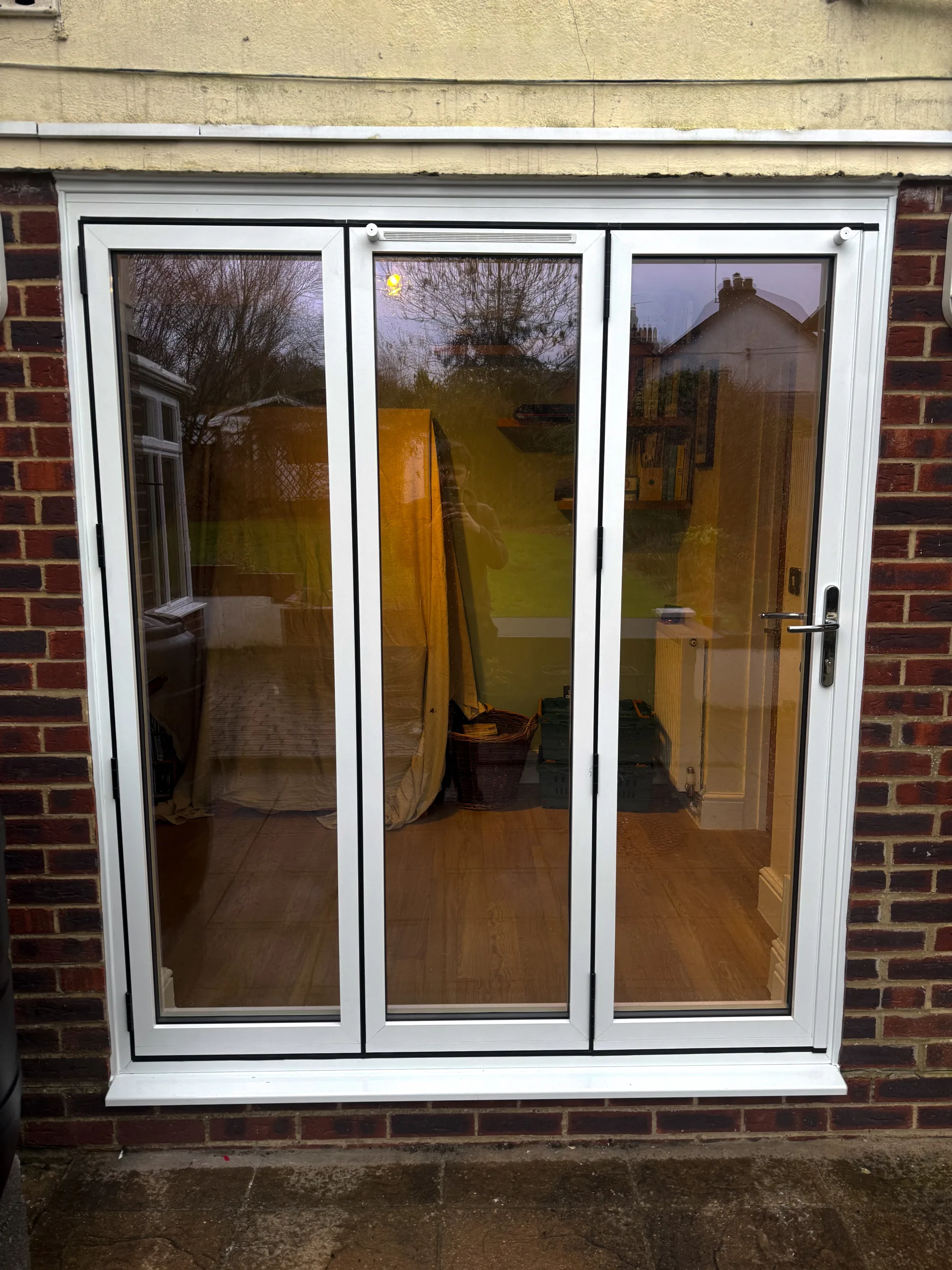 White bifold doors for a home in the New Forest.
