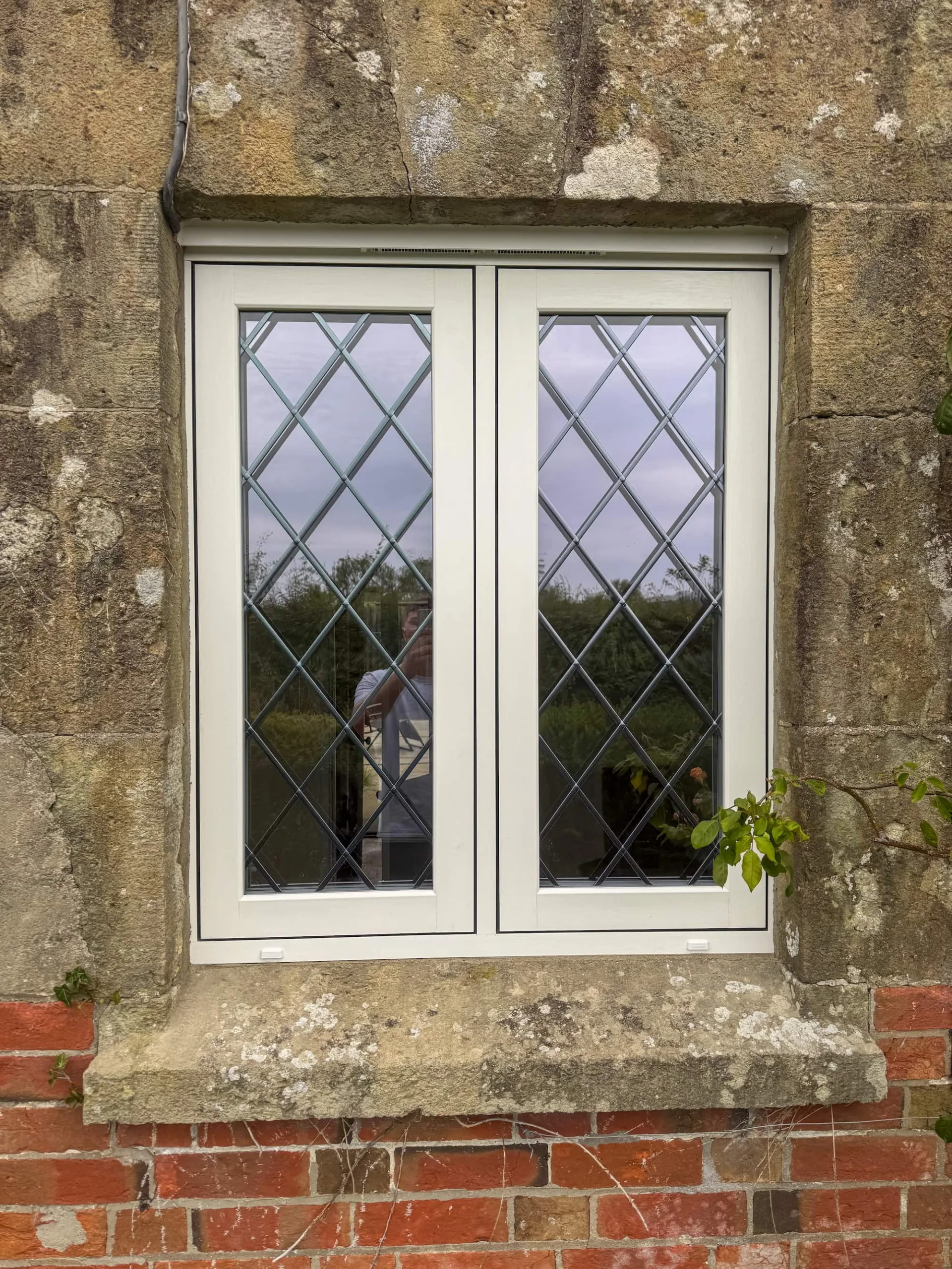 White timber windows for a home in Dorset.