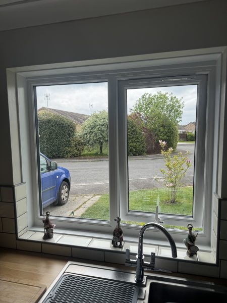 White uPVC kitchen window installation in Gillingham, Dorset by Goldhill Glazing
