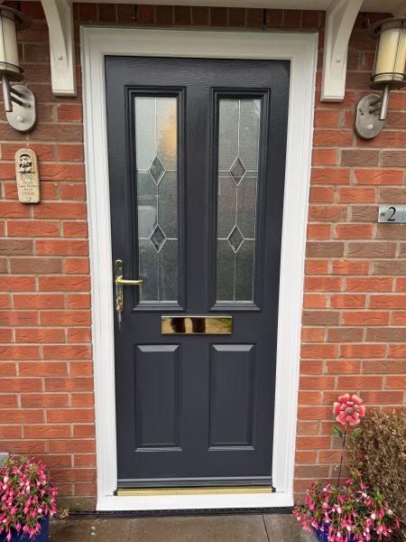 Anthracite grey composite front door installed in Blandford Forum