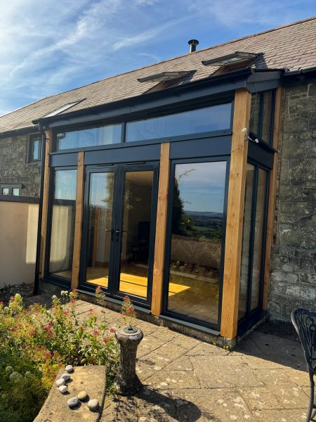 New aluminium glazed extension in Stour Row, Dorset