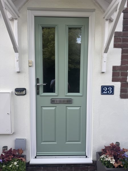 Sage green composite front door installed in Shaftesbury