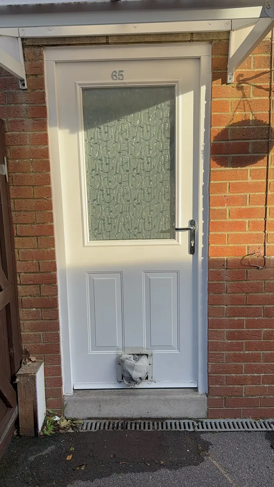 Old painted timber back door in Gillingham before replacement